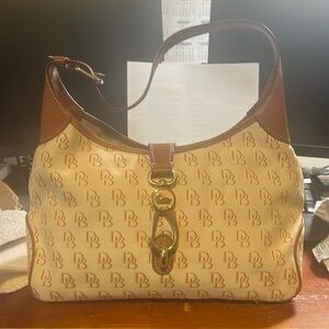 Dooney and Bourke Handbag with matching wristlet.